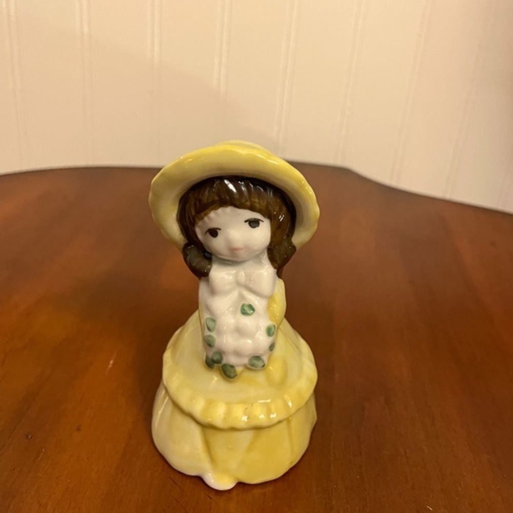 Vintage yellow hat girl‎ bell
